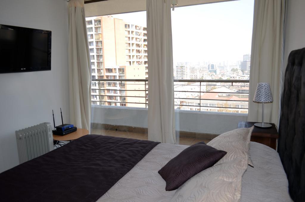 Apartamentos Capital Santiago Quarto foto